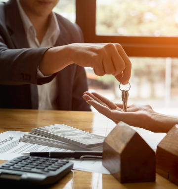 First-time home buyers reviewing property and home loan documents